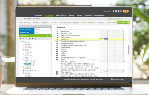 AdroitTW professional tax software running on a laptop